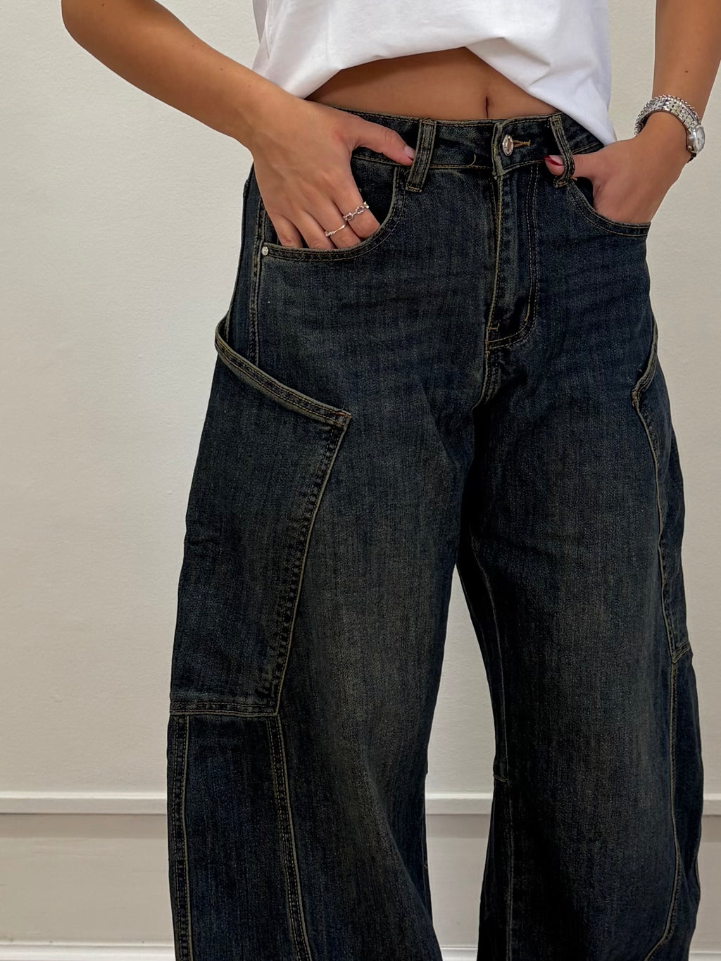 Jeans over con tasconi