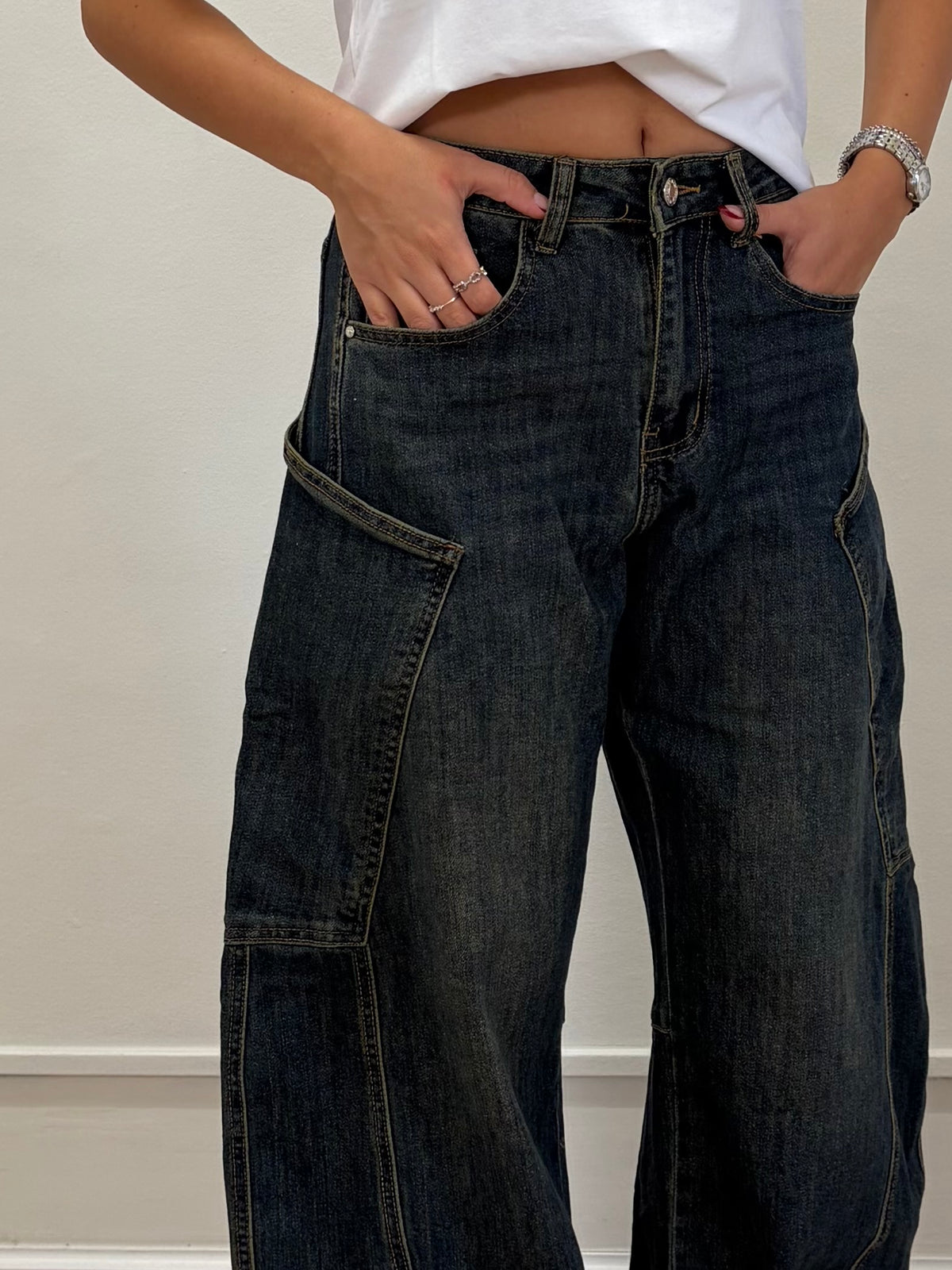 Jeans over con tasconi