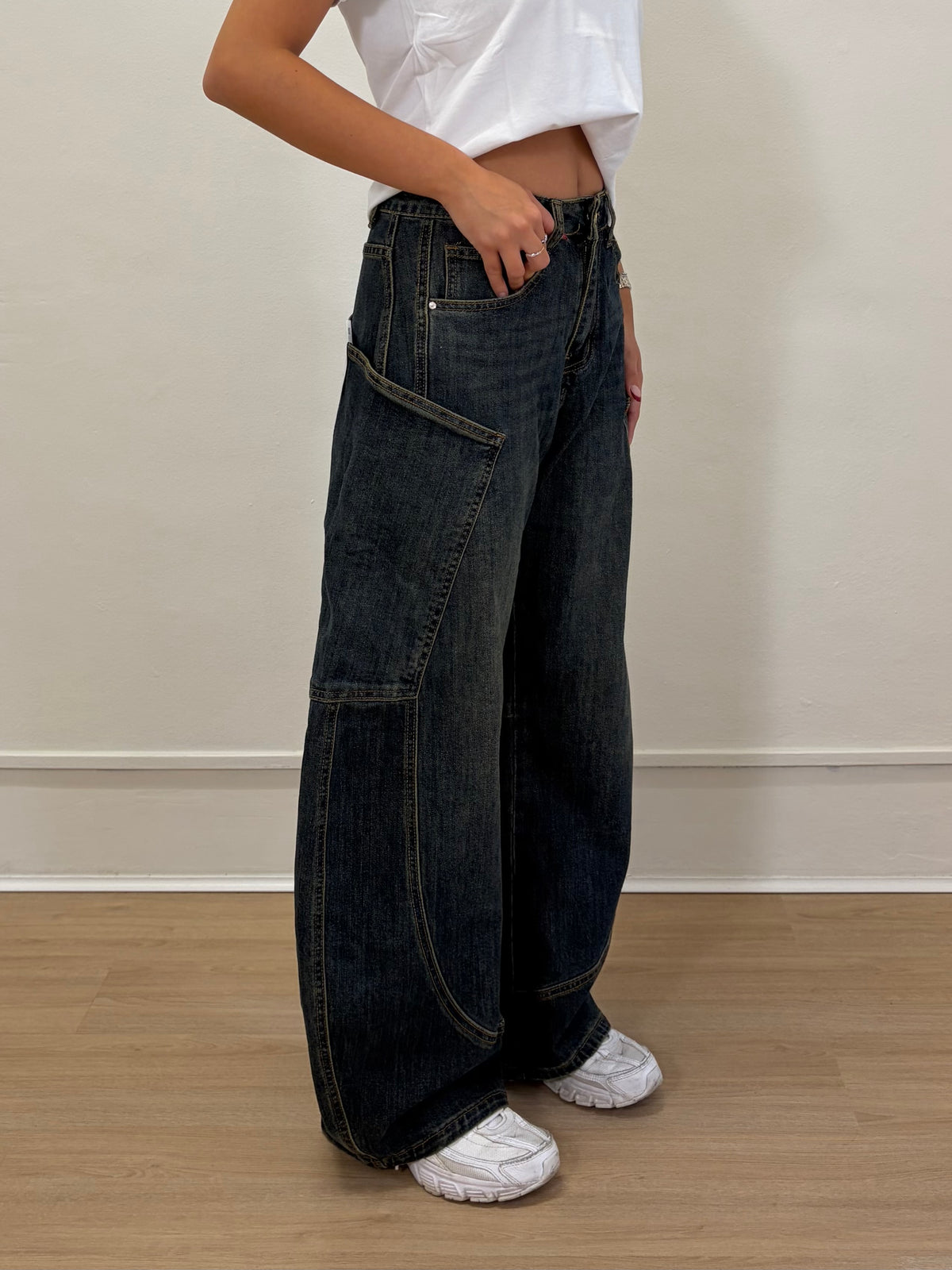 Jeans over con tasconi
