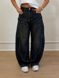 Jeans over con tasconi