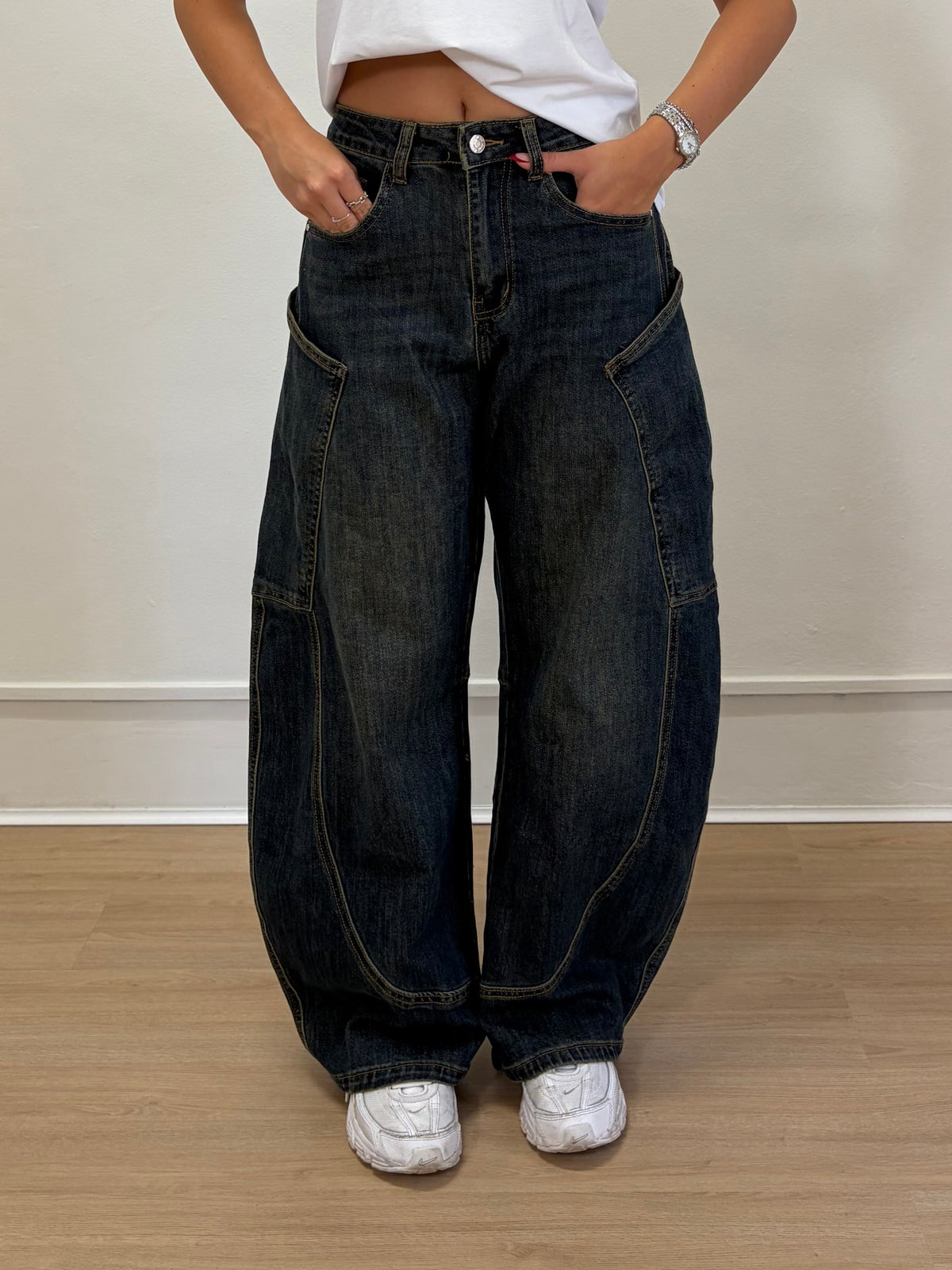 Jeans over con tasconi