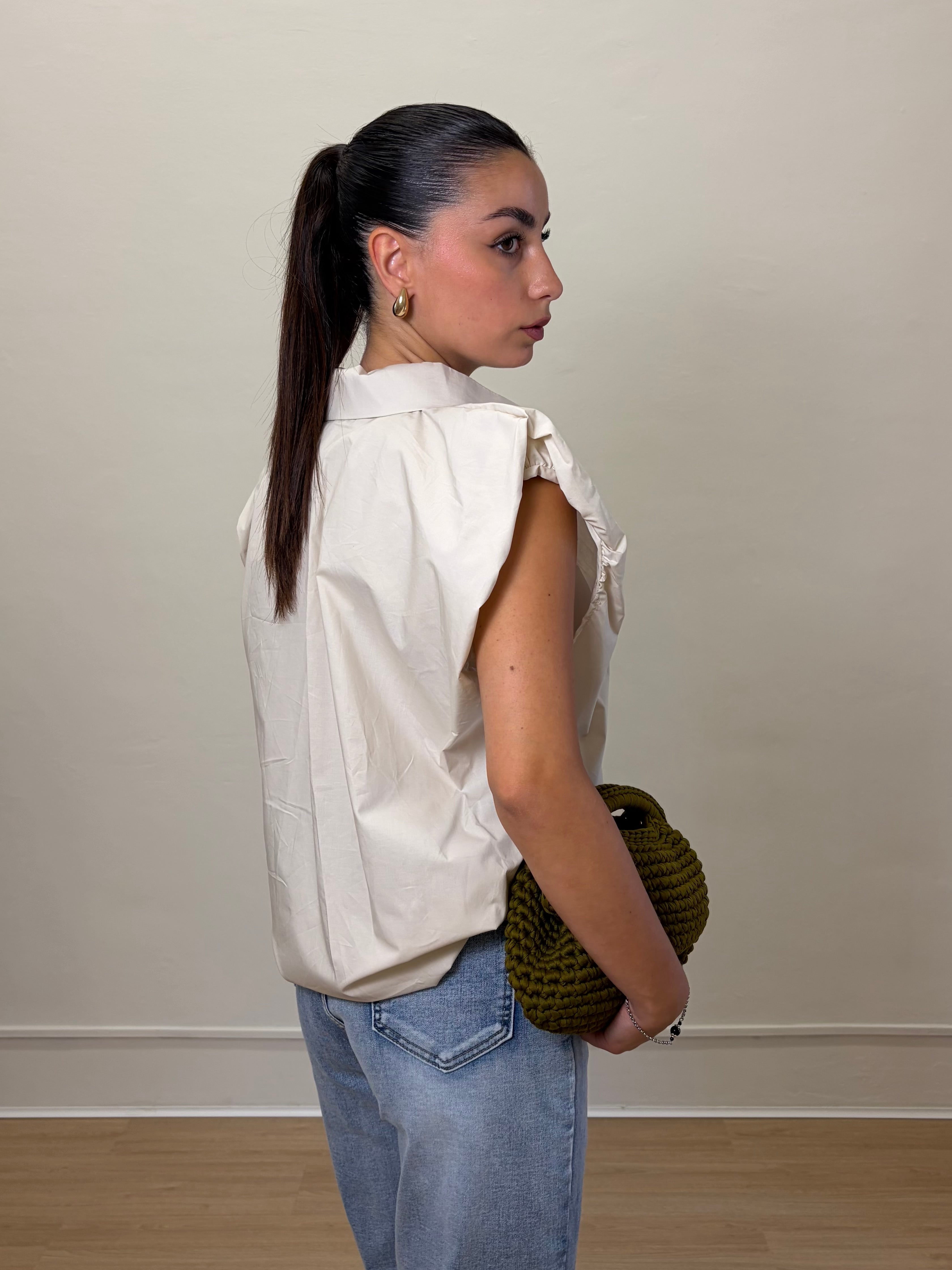 Camicia smanicata