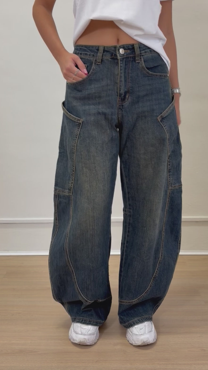 Jeans over con tasconi
