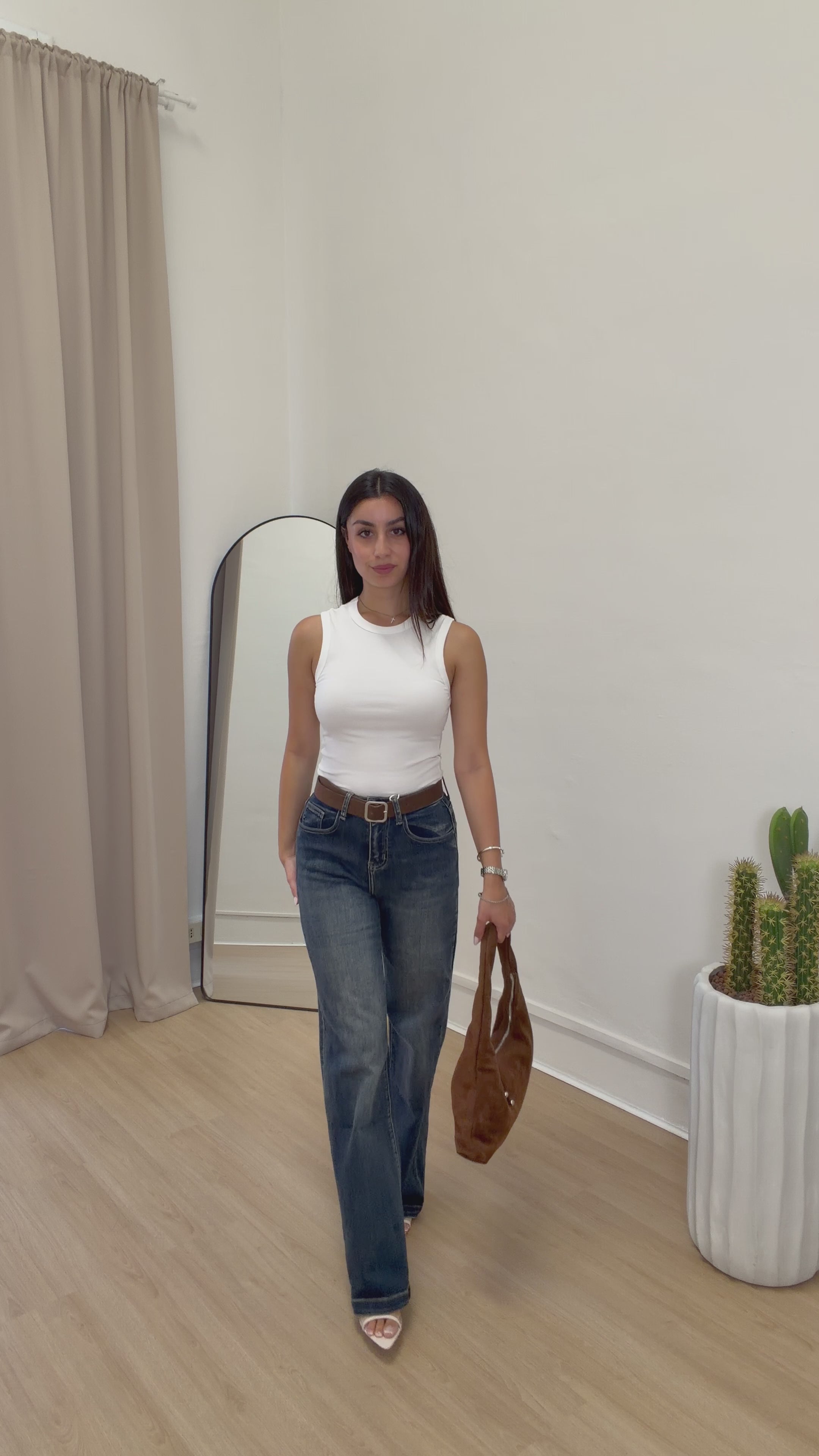 Jeans con cintura marrone